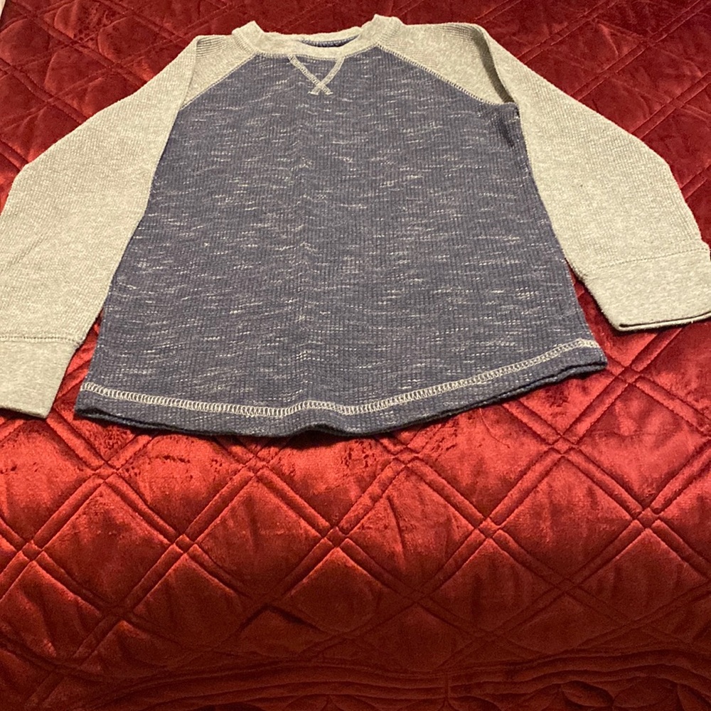 Long sleeve boys shirt.